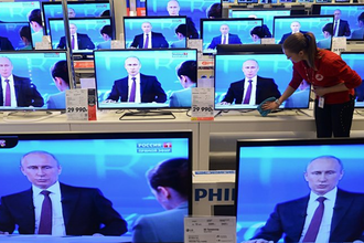 Путин на множестве телеэкранов